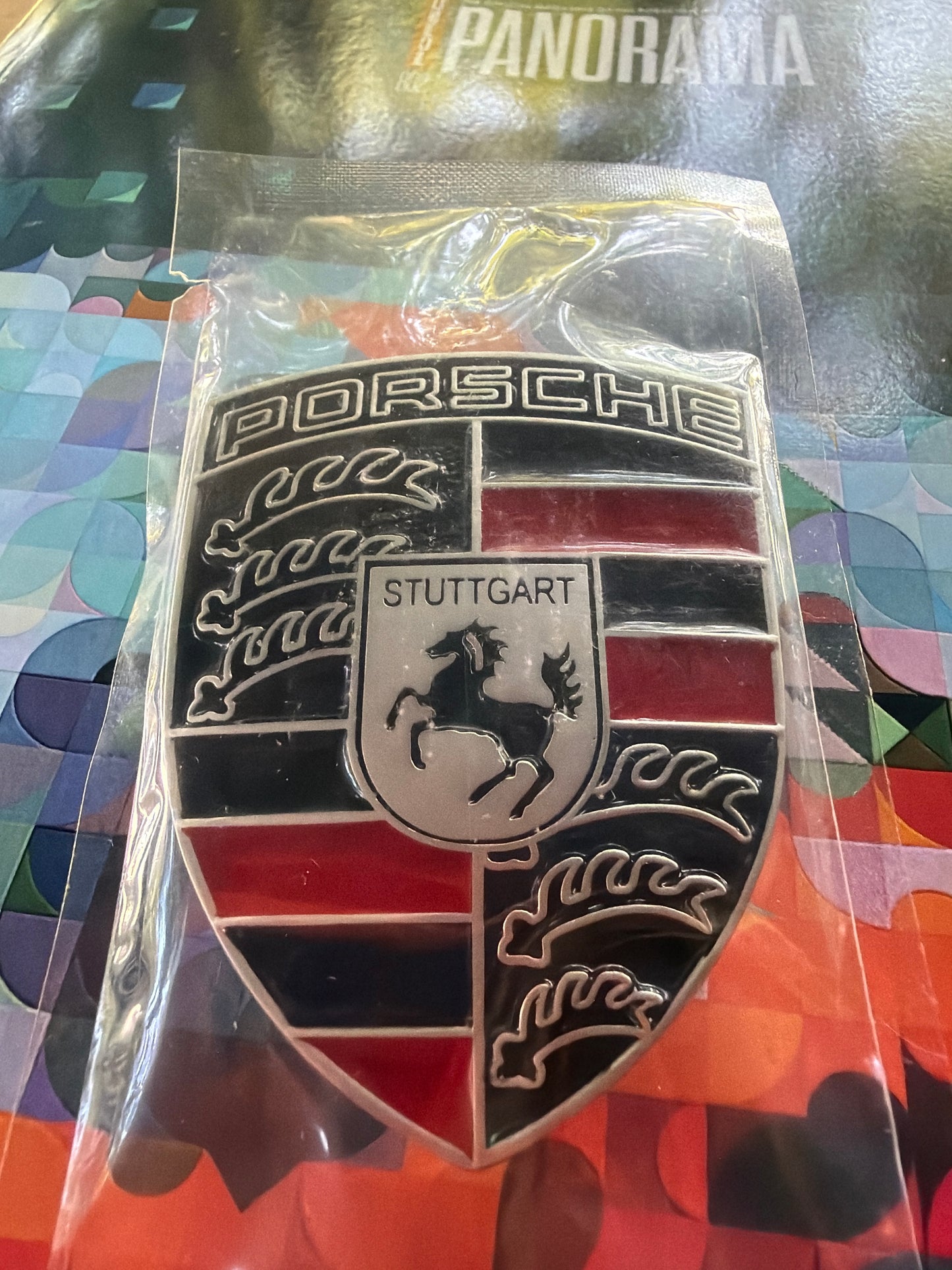 Porsche black & red hood crest emblem